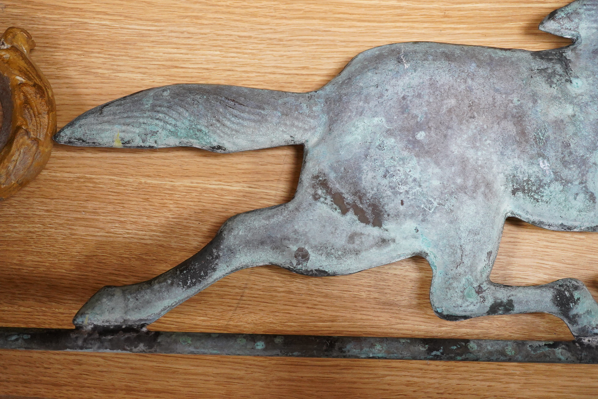 A copper ‘horse’ weather vane, 71cm wide.